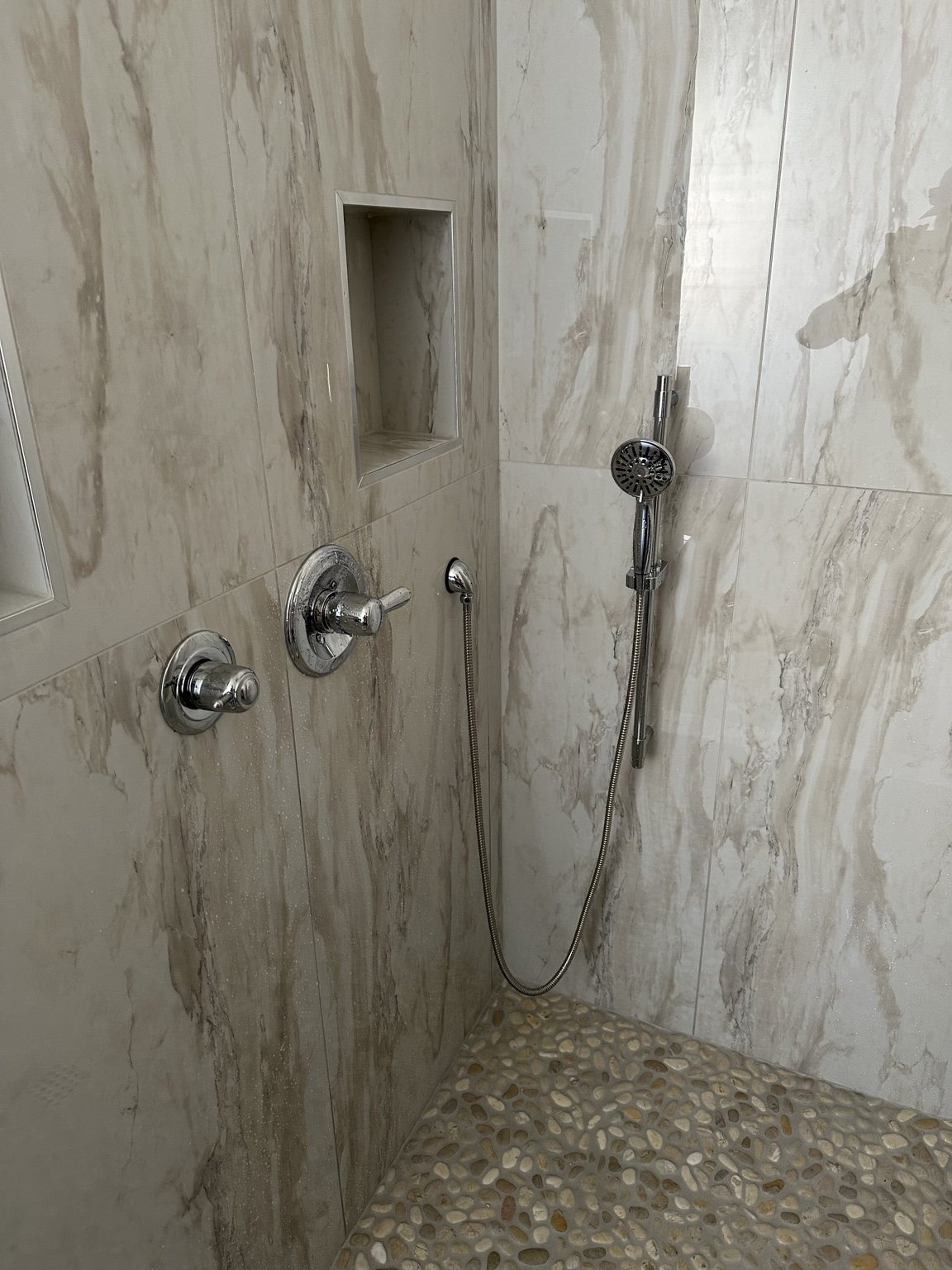 Finished custom shower remodel with premium fixtures