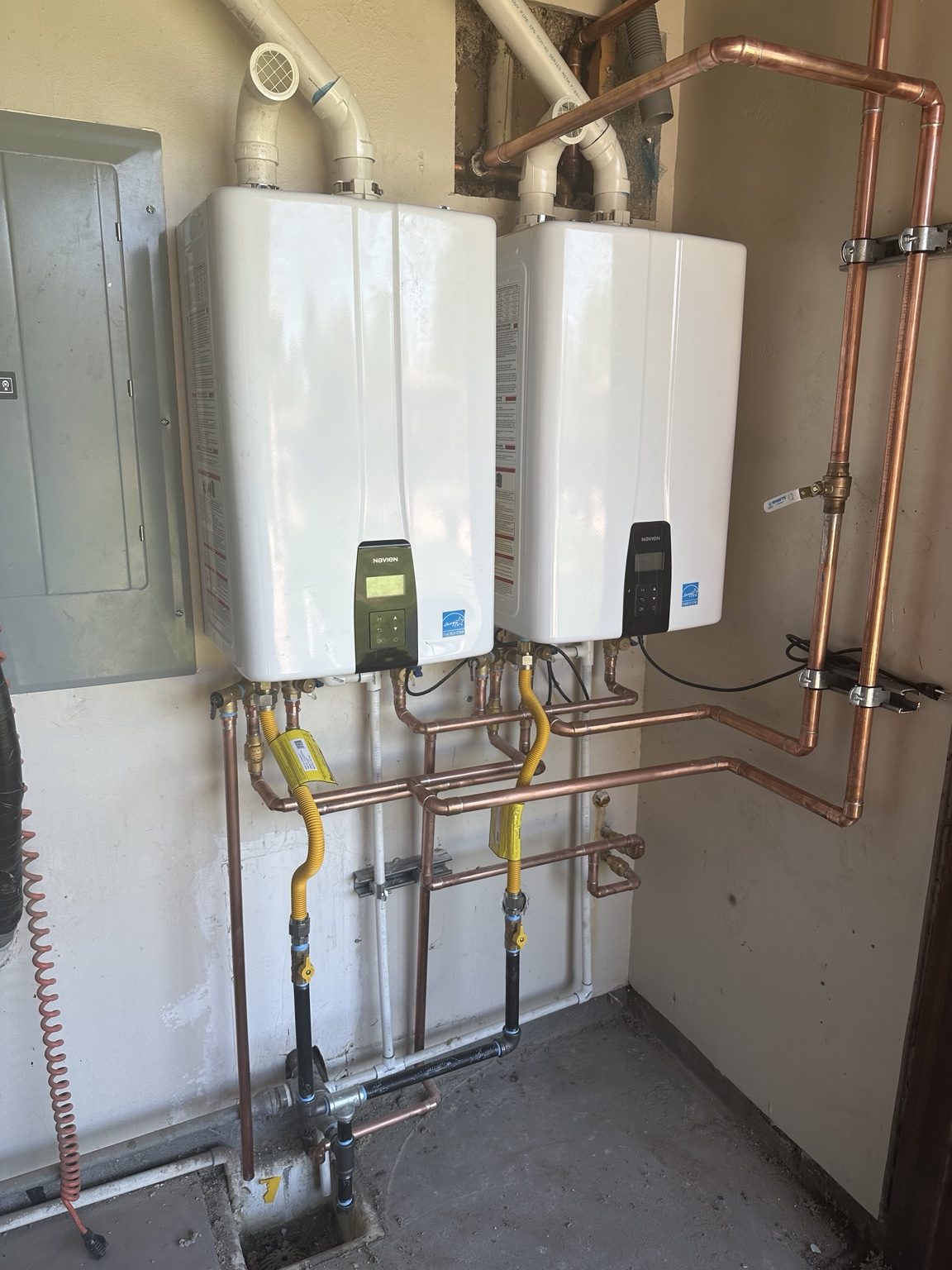 Dual tankless water heater installation by Calico Plumbing