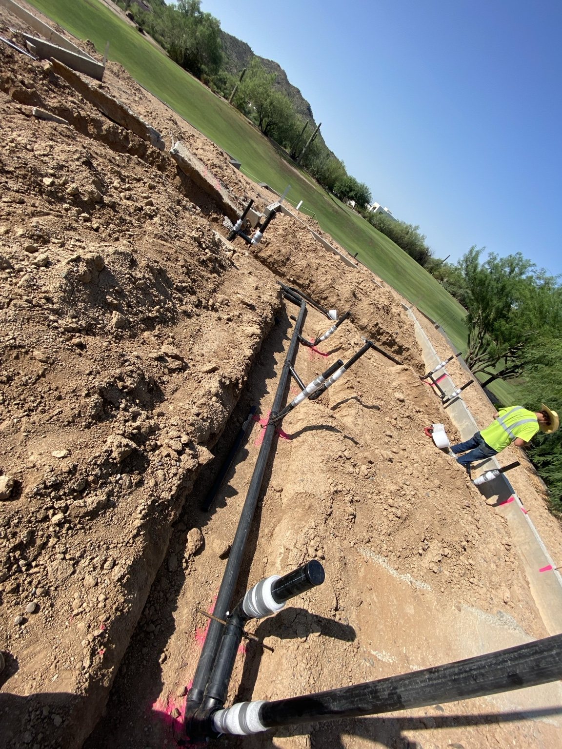 Close-up of underground drain system piping